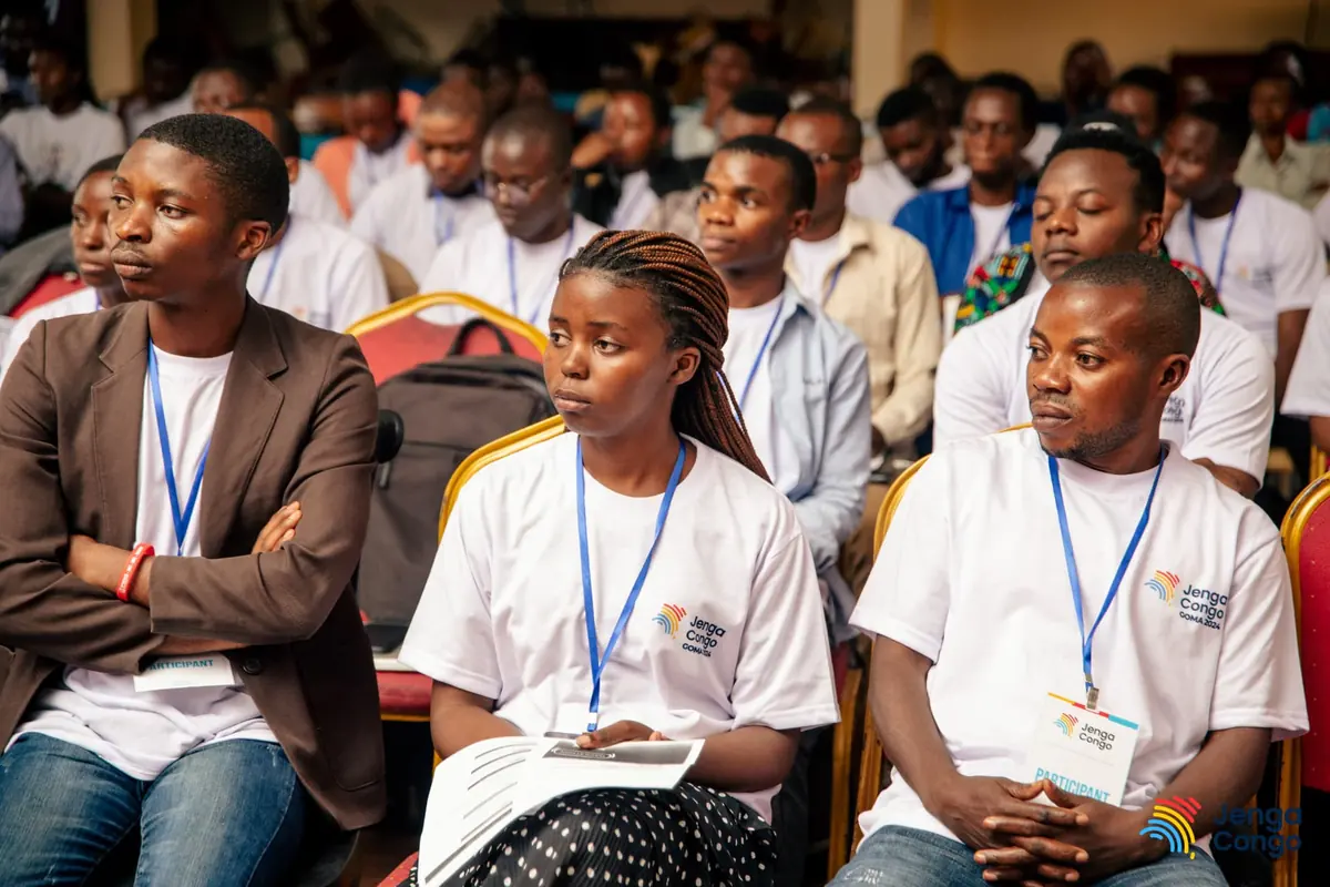 Participants listening during a hackathon session
